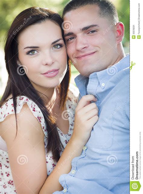 Loving Mixed Race Romantic Couple Portrait In The Park