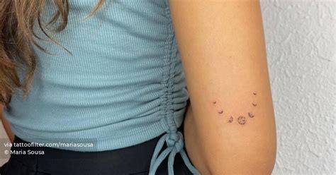 Fine Line Moon Phases Tattoo On The Tricep