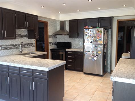 It takes a little more prep than painting a room. Spray Painted Oak Kitchen | Professional Kitchen Cabinet Painting and Refinishing services in ...