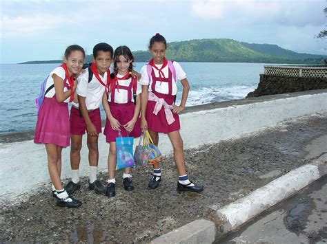 Filekids In School Uniform Along Waterfront Baracoa Cuba