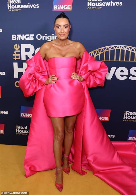 boobs ball gowns and broads nrl wag terry biviano stops traffic with her fuchsia frock and eye