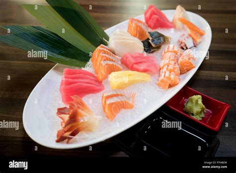 Mixed Sliced Fish Sashimi On Ice In White Bowl Sashimi Salmon Tuna