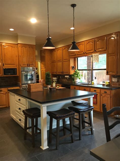 White oak kitchen cabinets are seeming to dominate current market trends. Updated kitchen with new white island, original honey oak ...