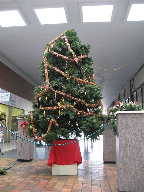 This list covers everything you might need, from the tree to the santa plates stashed in the view image. Worst Mall Christmas Tree Ever! | Flickr - Photo Sharing!