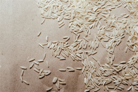 White Rice Grains On Brown Textile · Free Stock Photo