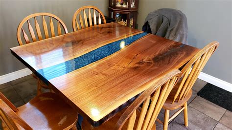 It looks like floting river and table leg made by industrial style pattern. My corona table creation black walnut resin river dining ...