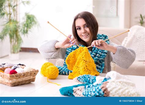 Young Beautiful Woman Knitting At Home Stock Photo Image Of Knitted