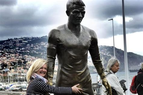 Cristiano ronaldo at the unveiling of the original bust. Cristiano Ronaldo's statue in Portugal has shiny bulge ...