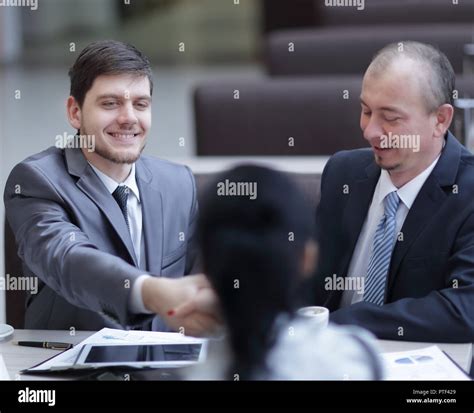 Handshake Manager And Customer In A Modern Office Stock Photo Alamy