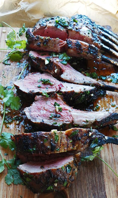 Quickly searing the racks and then grilling them over low heat makes the lamb perfectly browned outside and pink within. Spiced Grilled Rack of Lamb