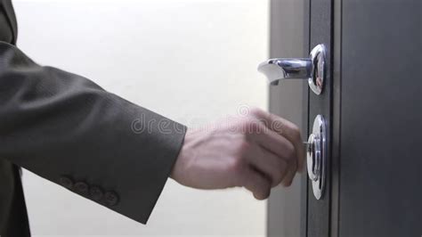 A Businessman Unlocks A House`s Door With Key And Enters 3840x2160 Stock Video Video Of Gate