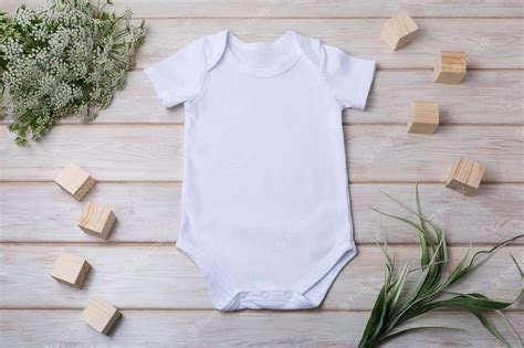 Premium Photo White Cotton Baby Short Sleeve Onesie Mockup With Green