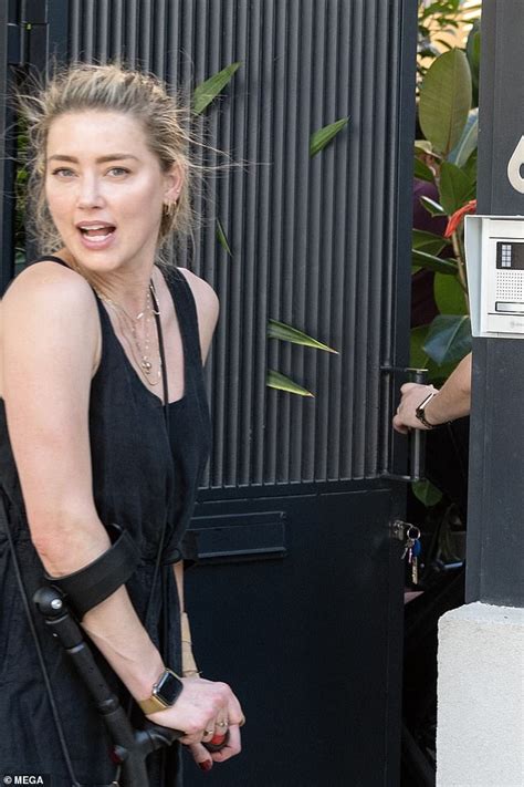 Breaking Amber Heard Pictured Hobbling On Nycs Streets Using Crutches Small Joys