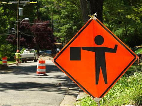Flagman Ahead Sign Stock Photos Pictures And Royalty Free Images Istock