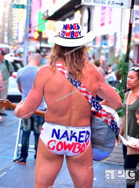 The Naked Cowboy Playing His Guitar In Times Square New York City Featuring Naked Cowboy Where
