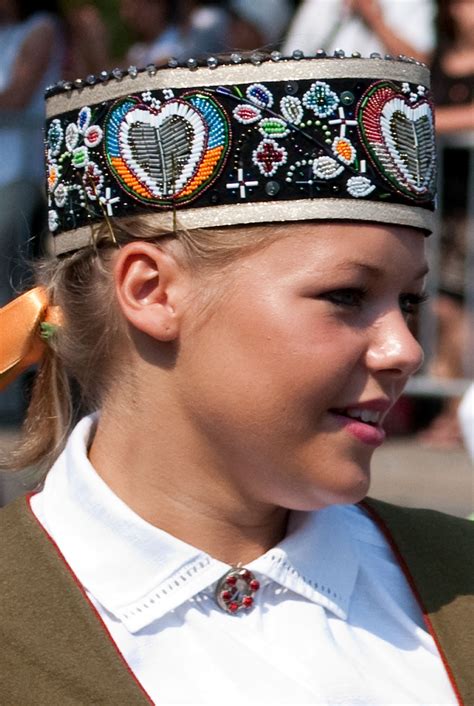 Girl From The Parade Of The Song And Dance Festival Dressed In Latvian