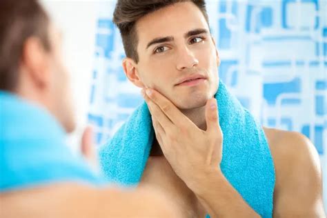 Man Touching His Face After Shaving Stock Image Everypixel