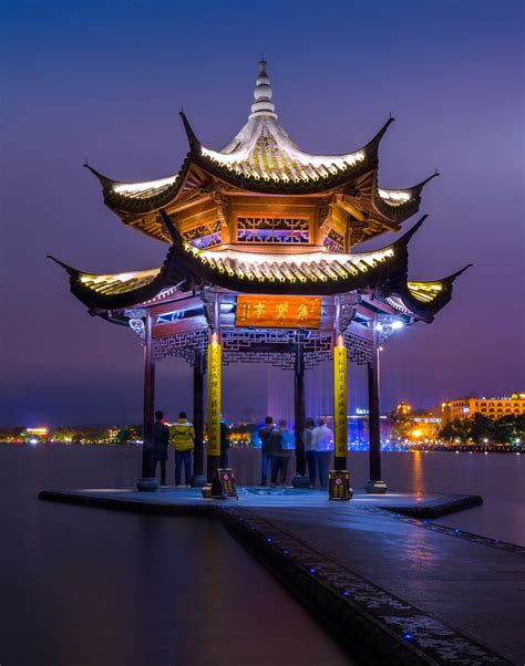 Brilliantly Lit West Lakes Jixian Pavilion Here In Hangzhou Is One Of