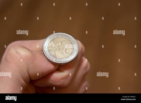 Tossing Euro Coin Heads Or Tails You Decide Stock Photo Alamy