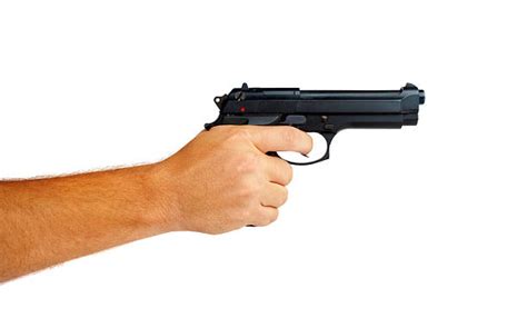 Best Hand Holding Gun Stock Photos Pictures And Royalty Free Images Istock