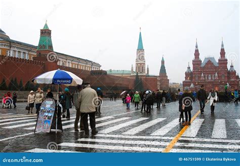 People Walk On The Red Square In Moscow Gum Building Editorial Stock