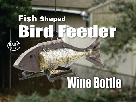 Ensure your fish are fed on schedule with a homemade fish feeder! DIY Fish Shaped Wine Bottle Bird Feeder How to Make Video ...