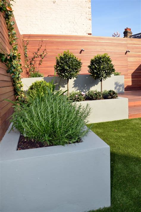 Modern Garden Design Artificial Grass Raised Beds Hardwood Decking