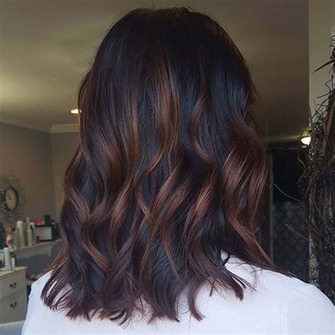 The hairstyle and the highlights portrayed over here is a little different as if the top portion of the hair is one color and the rest have another color. 23 Different Ways to Rock Dark Brown Hair with Highlights ...