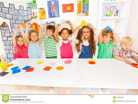 Happy Boys And Girls In The Kindergarten Art Class Stock