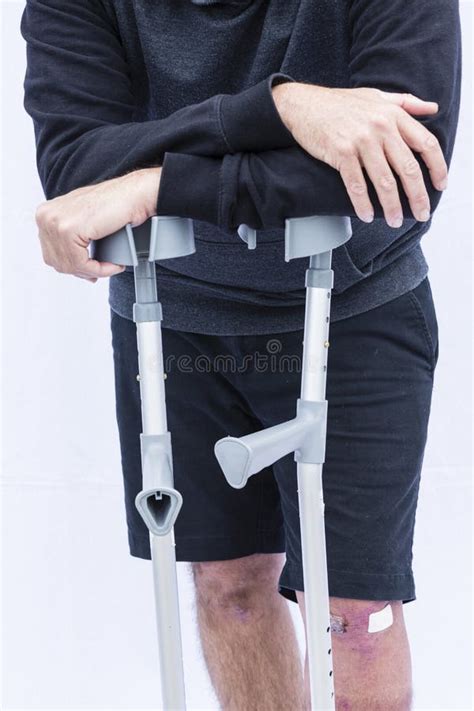 Man On Crutches Stock Photo Image Of Walking Hurt Knee 44965338