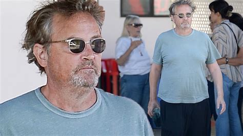 Matthew Perry Looks Slightly Disheveled In Sweatpants And T Shirt While