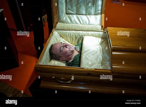 Paris France Man Laying In Funeral Casket At Death Trade Show Salon