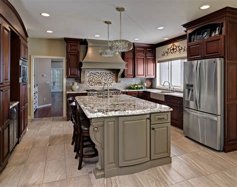 Traditional Cherry Cabinets With Medium Brown Painted Island Crystal