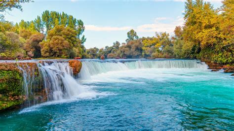 Waterfall Pouring On River Surrounded By Green Trees In Forest Hd