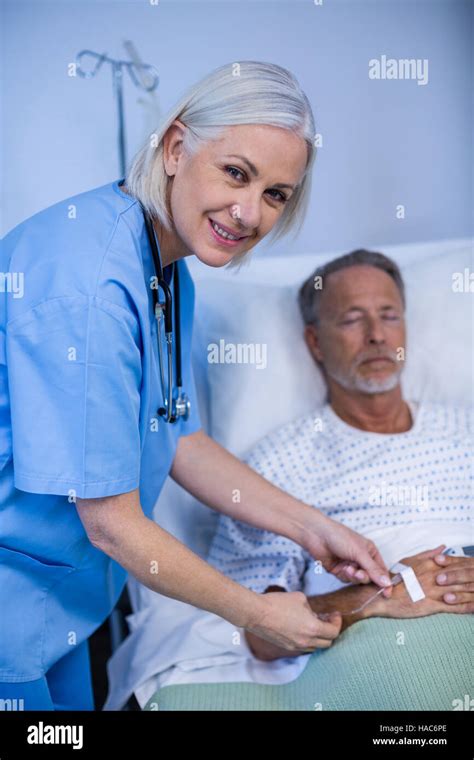 Nurse Examining A Patient Stock Photo Alamy