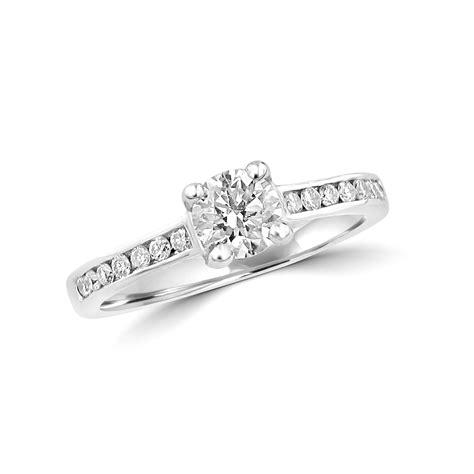 Half Carat Round Diamond With Diamond Band Engagement Ring In Platinum