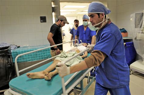 American Afghan Docts Begin Surgical Process For Young Burn Victim