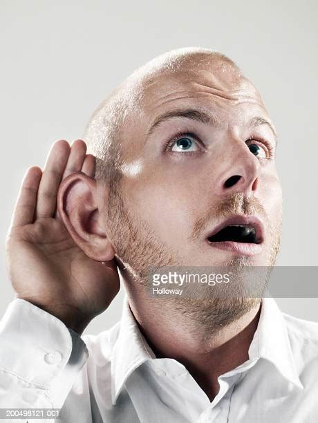 Hand Cupped To Ear Photos And Premium High Res Pictures Getty Images