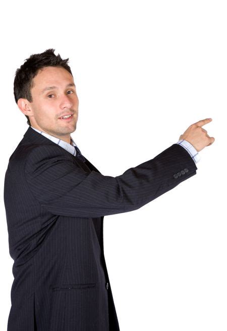 Business Man Pointing At Something Over A White Background Freestock