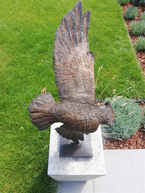 Large Flying Owl Made Out Of Bronze