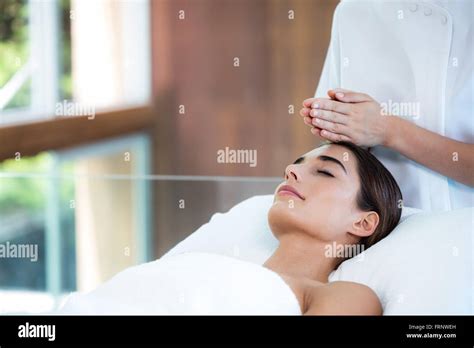 Woman Receiving Massage From Masseur Stock Photo Alamy