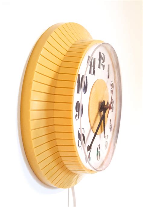 Vintage Deco Yellow Electric Wall Clock