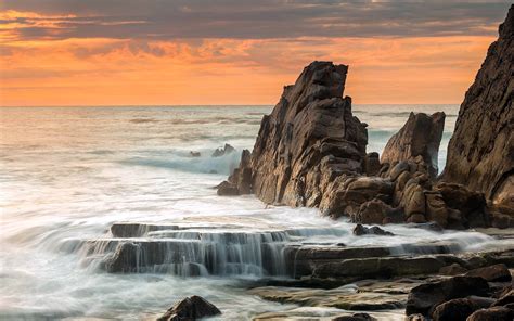Sea Rocks Landscape Sunset Ocean Waves Wallpaper