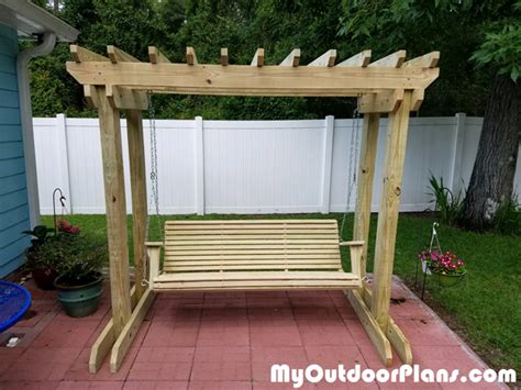 A simple swingset design with a slide and a ladder installed to the clubhouse, this can be made with the simple swing set plans. DIY Arbor with Swing | MyOutdoorPlans | Free Woodworking ...