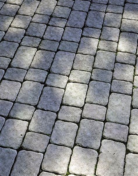 Learn The Pros And Cons Of Cobblestone Pavers Cobblestone Pavers Cobblestone Patio Paver