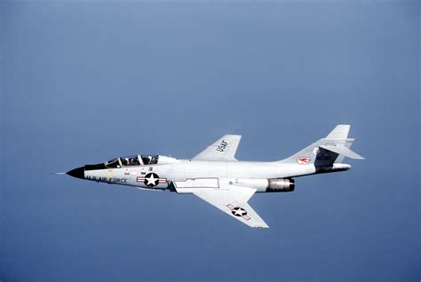 a-left-side-view-of-an-f-101-voodoo-aircraft-banking-to-the-left-in