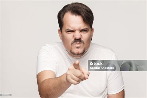 Anger Adult Man Pointing Finger At Camera Stock Photo Download Image