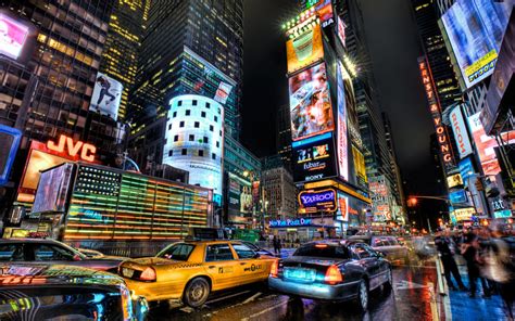 Times Square On A Rainy Night In New York City Uniworld News