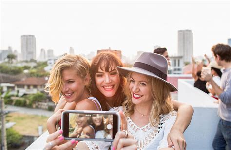 Three Girlfriends Taking A Selfie By Jovo Jovanovic