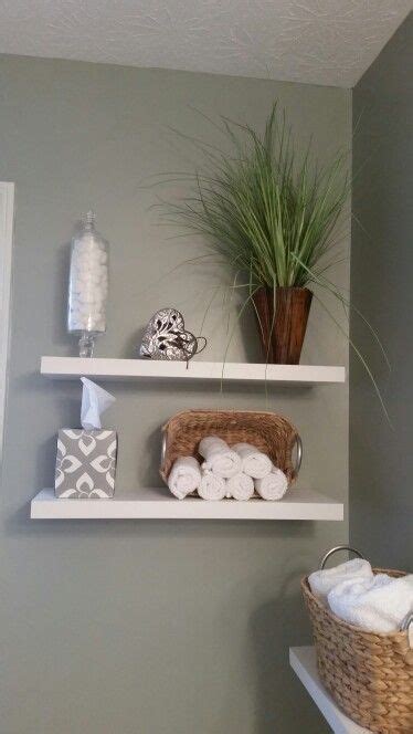Change a little of your decoration and see how an empty shelf can turn into a designated spa corner of the room. Love the floating shelves in my spa themed bathroom. Lowe ...